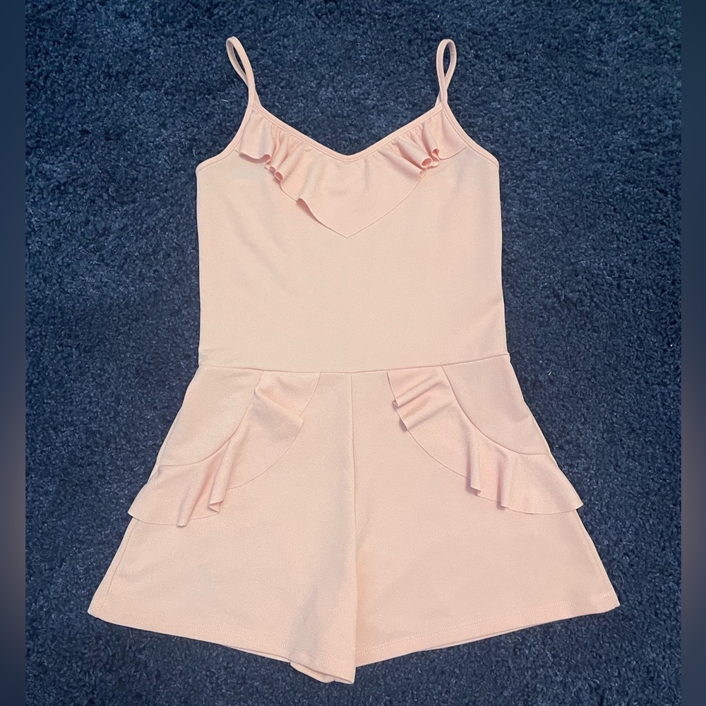 Light pink romper. Brand new.